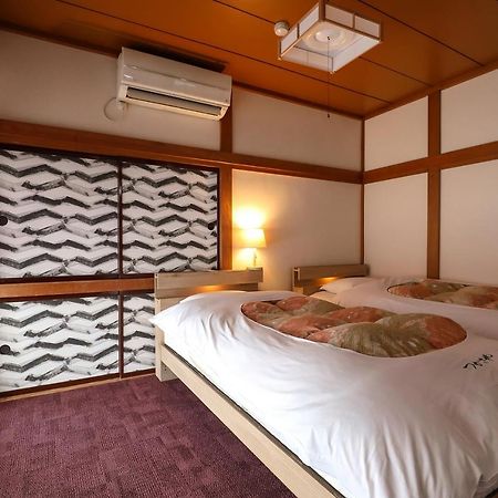 Tsukasaya Ryokan Цуруока Экстерьер фото