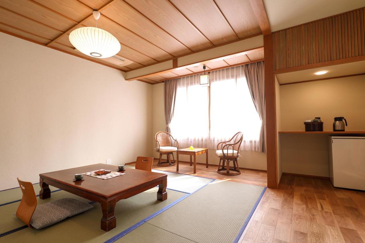 Tsukasaya Ryokan Цуруока Экстерьер фото