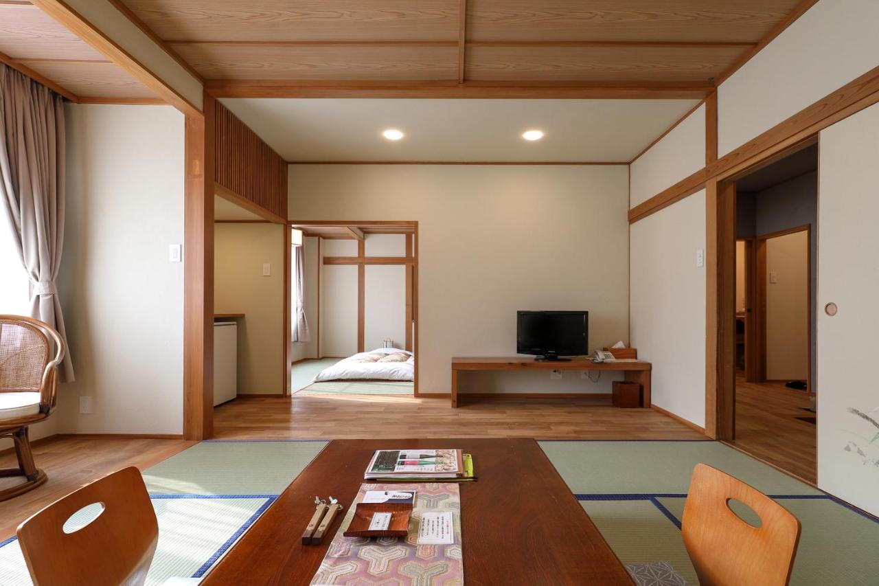 Tsukasaya Ryokan Цуруока Экстерьер фото