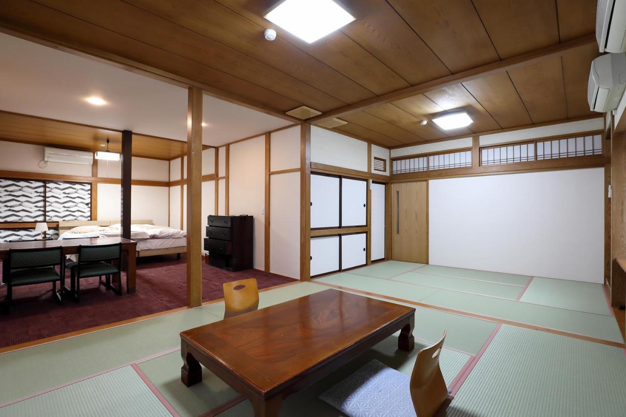 Tsukasaya Ryokan Цуруока Экстерьер фото