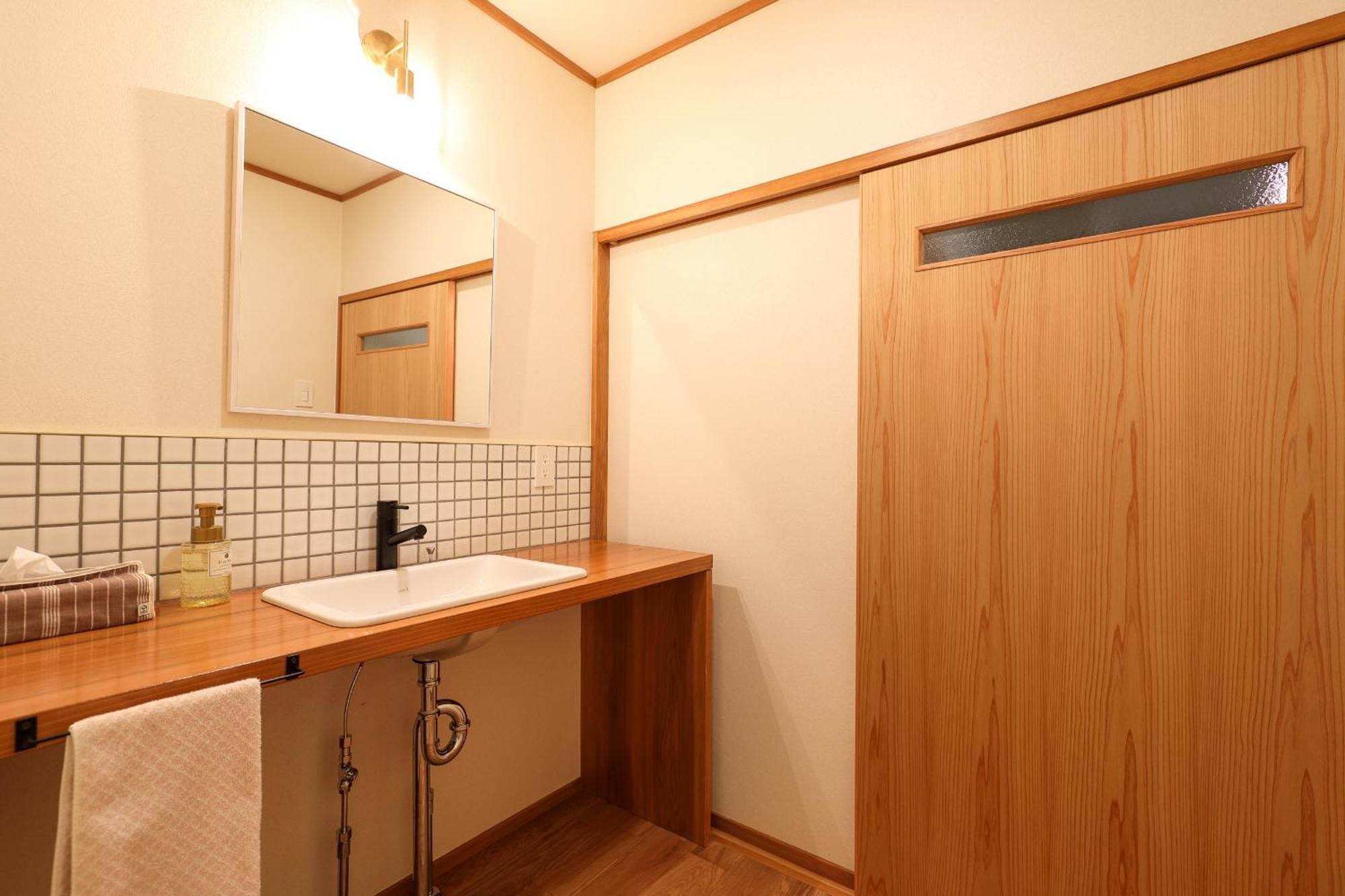 Tsukasaya Ryokan Цуруока Экстерьер фото