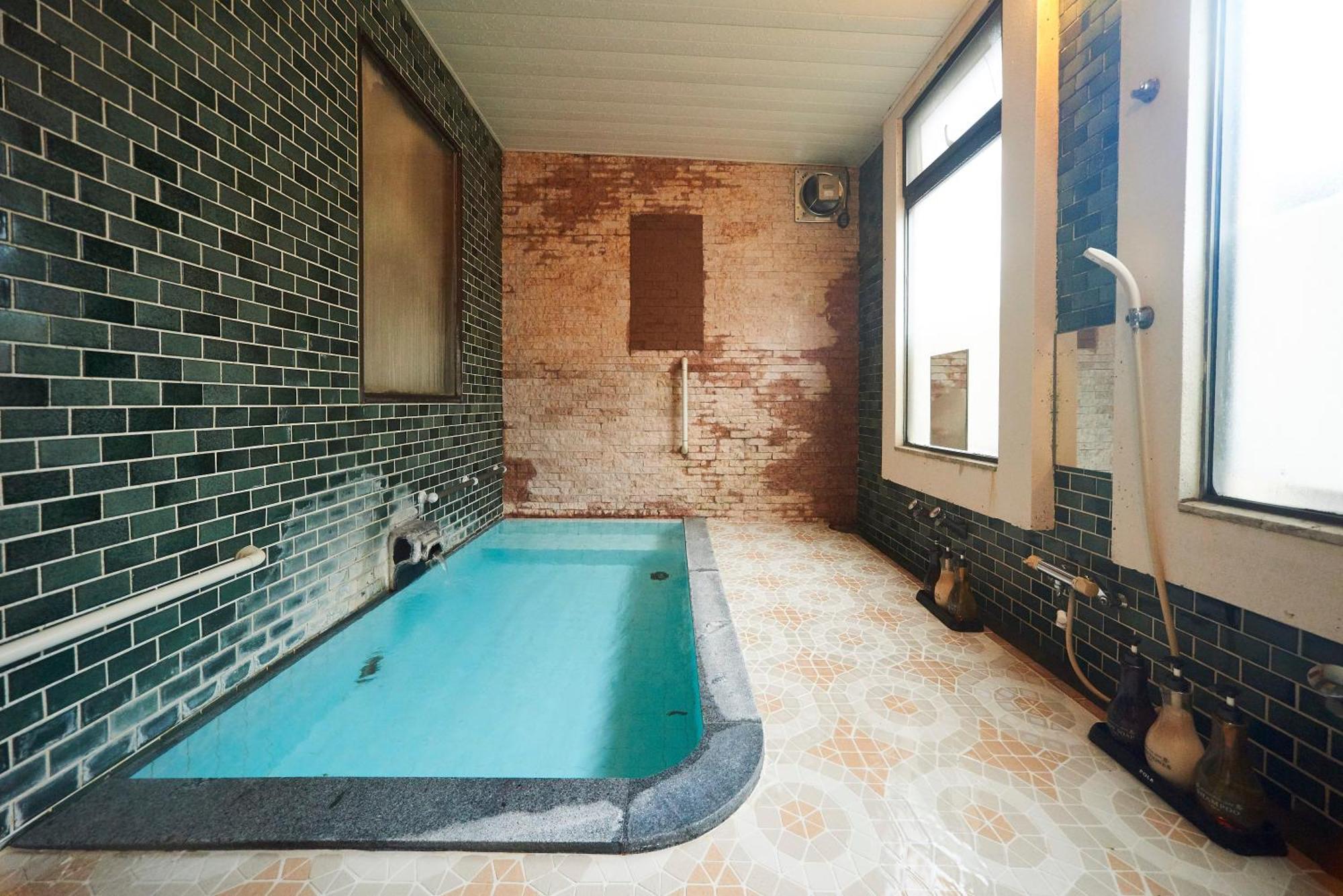 Tsukasaya Ryokan Цуруока Экстерьер фото
